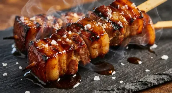 Sticky pork belly skewers