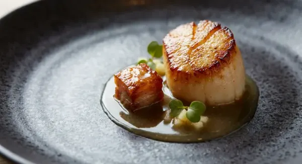 Seared scallops, crispy belly pork, russet apple beurre blanc