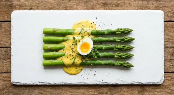 New season asparagus with bearnaise sauce and quails' eggs